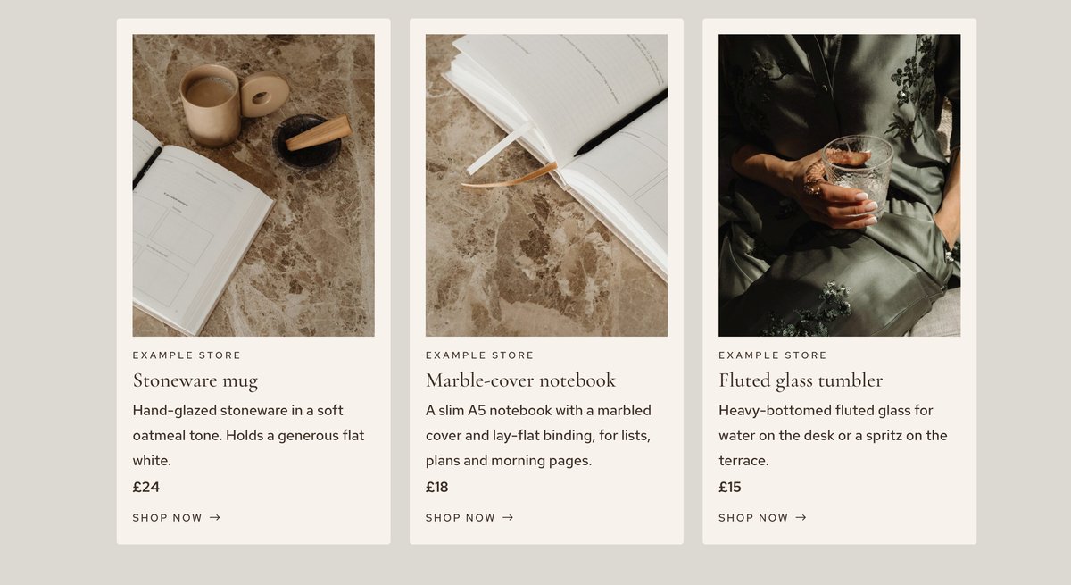 ShopCard product cards on the Romy demo Three ShopCard product cards from the Romy demo: a stoneware mug, a marble-cover notebook and a fluted glass tumbler, each with retailer, description, price and Shop now link